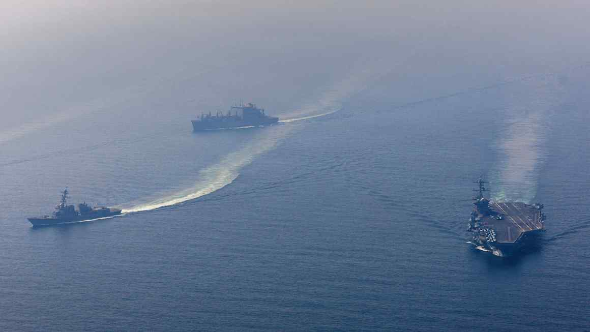 US warns Iran to make a deal as it steps up military deployments